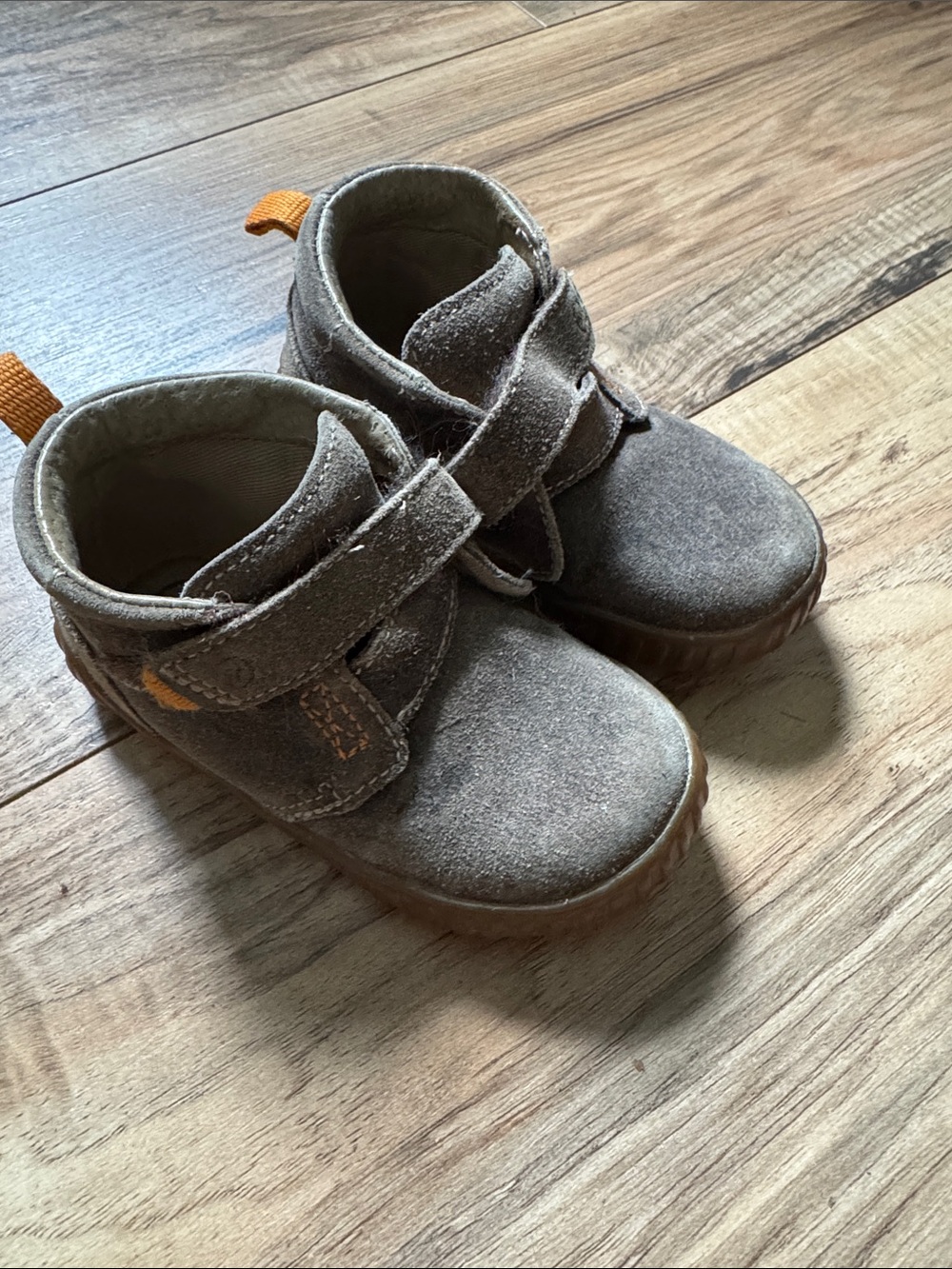 Soft brown stride rite boots with orange details